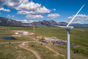 Wind turbine in front of mountains Researchers at the National Renewable Energy Laboratory’s Flatirons Campus study wind energy, water power, and the process of integrating renewable energy resources into the grid (Photo by Joshua Bauer, NREL) FlexPower NREL
