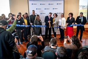 Crowley's Jeff Andreini, vice president of Wind Services (center left) is joined by Nancy Olson, president and CEO, Greater Eureka Chamber of Commerce (center right), and other community leaders for a ribbon cutting ceremony to celebrate the opening of Crowley's Eureka office Eureka Office Opening