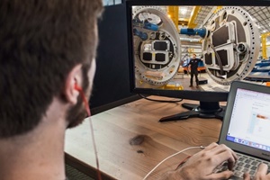 TÜV NORD employee uses an inspection tool to carry out manufacturing evaluation remotely TUV Nord remote inspection